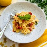 A plate of farfalle pasta in a creamy boursin cheese sauce.