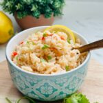Bowl of Creole rice, a flavorful dish with rice and assorted spices, served ready to enjoy.