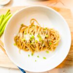 Garlic butter noodles: al dente pasta tossed in a creamy garlic butter sauce, infused with aromatic herbs and topped with grated Parmesan cheese.