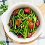 Adobong Sitaw dish with chorizo, featuring string beans cooked in savory soy sauce and vinegar with added chorizo slices.