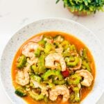 lose-up of Ginisang Ampalaya with Shrimp served on a plate.