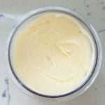 Close-up of Ninja Creami vanilla ice cream after spinning. The ice cream has a creamy, smooth texture, with a rich vanilla flavor, having been processed to achieve its perfect consistency and ready to be served.