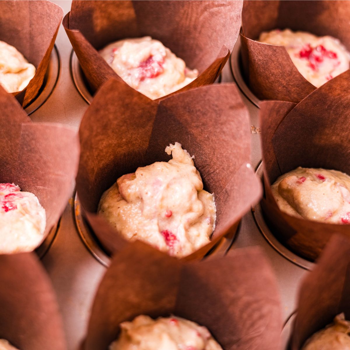 Raspberry banana muffins ready to be baked.