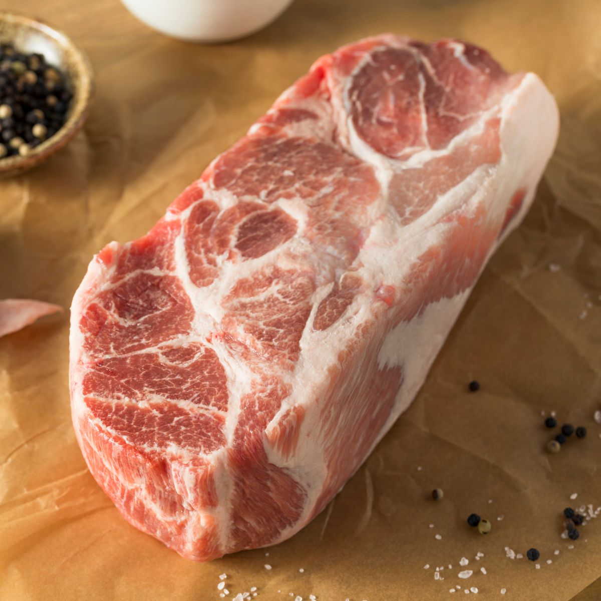 Boneless pork shoulder (kasim) cut ready for cooking.