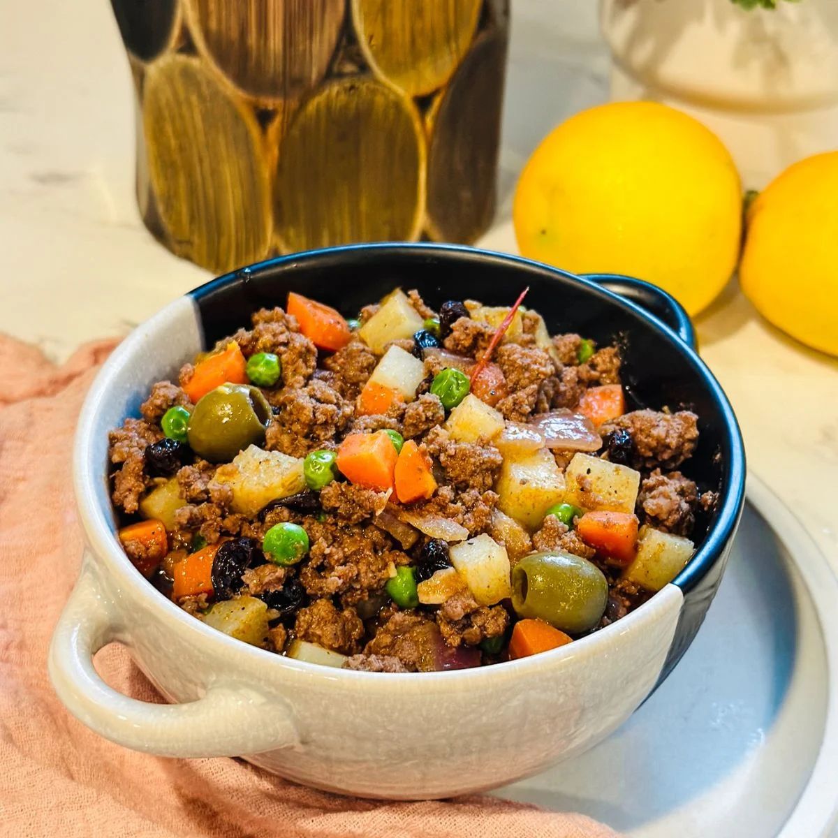 Filipino Beef Picadillo served with rice โ ground beef, potatoes, and tomato sauce for a quick, comforting weeknight meal.