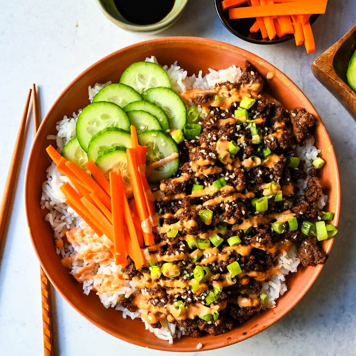 Sweet and savory Korean Beef Bowls served over rice โ quick 20-minute ground beef recipe.