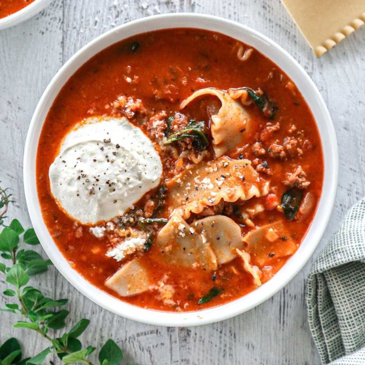 One Pot Lasagna Soup topped with whipped cottage cheese โ cozy 30-minute comfort dinner.