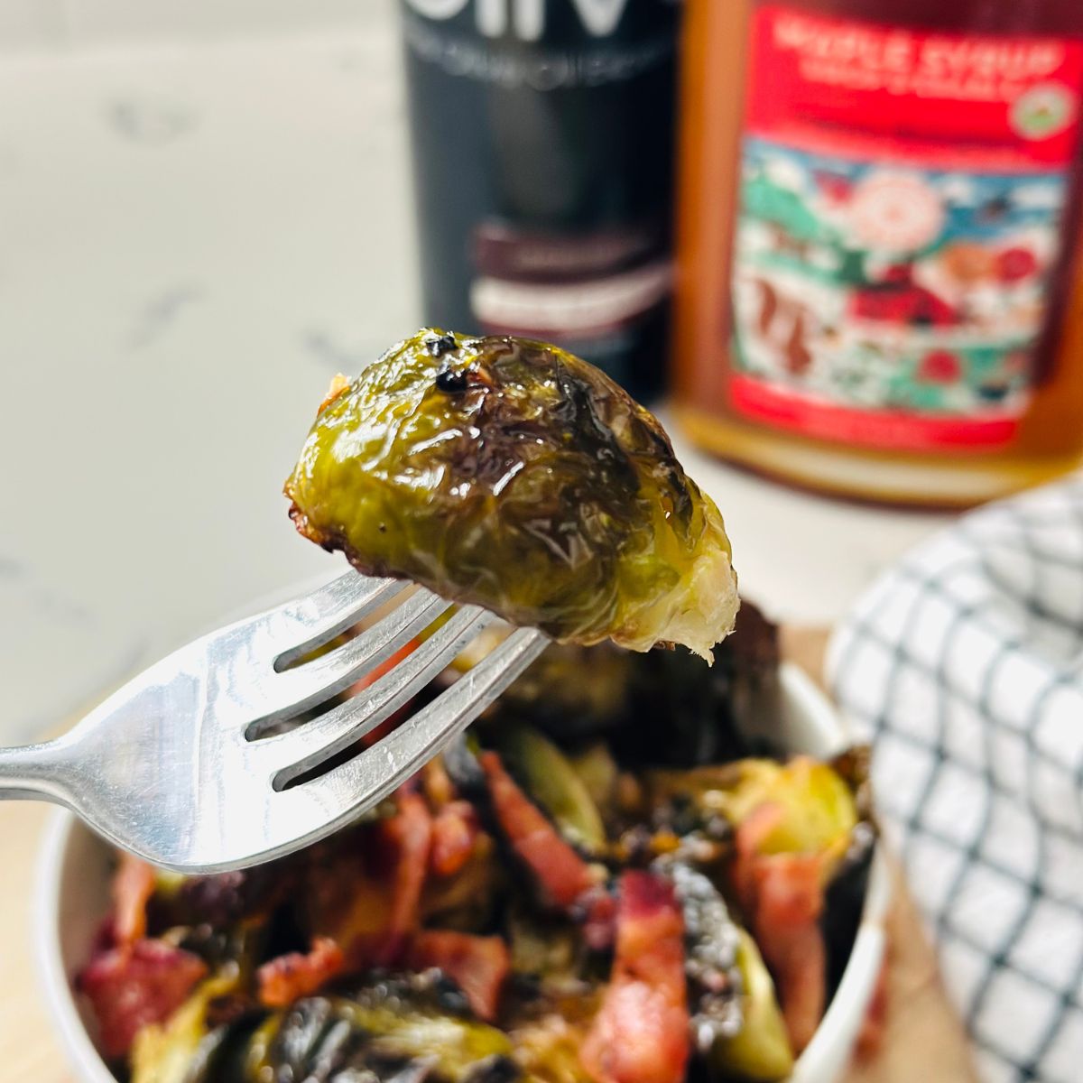 Roasted brussels sprouts with balsamic maple glaze ready to be enjoyed.