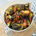 Roasted brussels sprouts with balsamic maple glaze ready to be enjoyed.