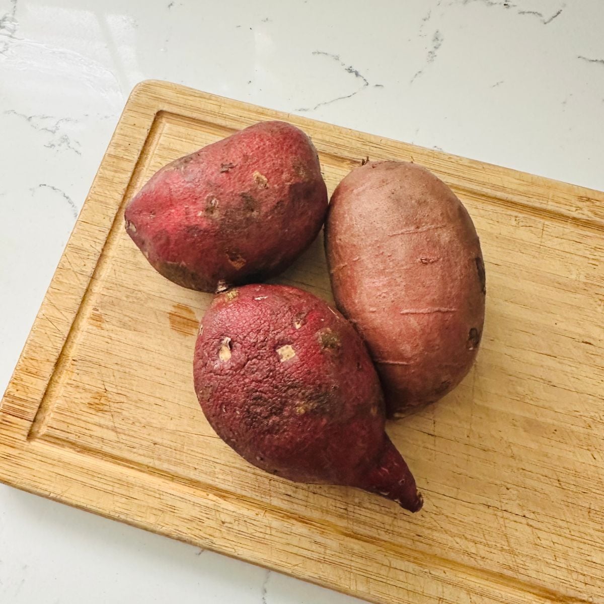 fresh kamote sweet potatoes raw ingredient for camote cue recipe