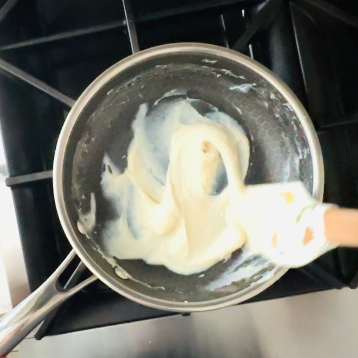 Tangzhong paste cooking in a small saucepan for malunggay pandesal dough.