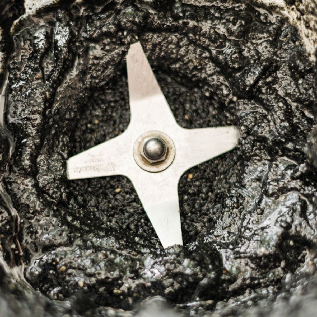 Freshly blended black sesame paste with a thick, glossy texture.