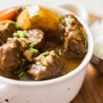 Japanese beef curry with tender beef, potatoes, and carrots served with rice.