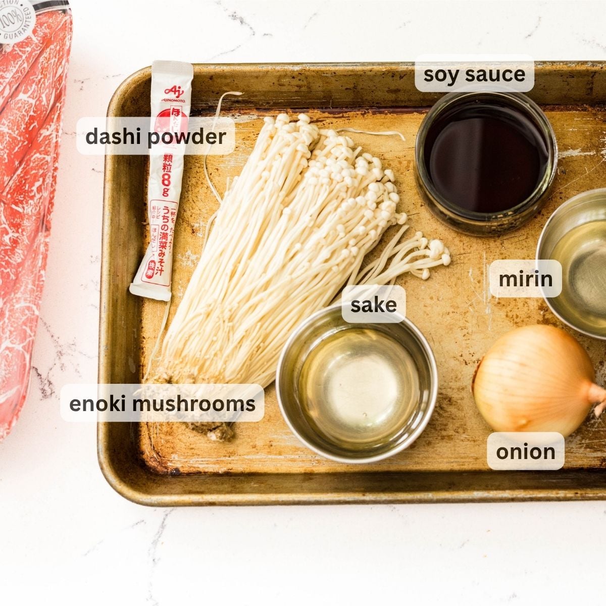 Ingredients for enoki beef rolls including enoki mushrooms, onion, dashi powder, soy sauce, mirin, and sake