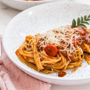 Filipino spaghetti noodles topped with sweet meat sauce