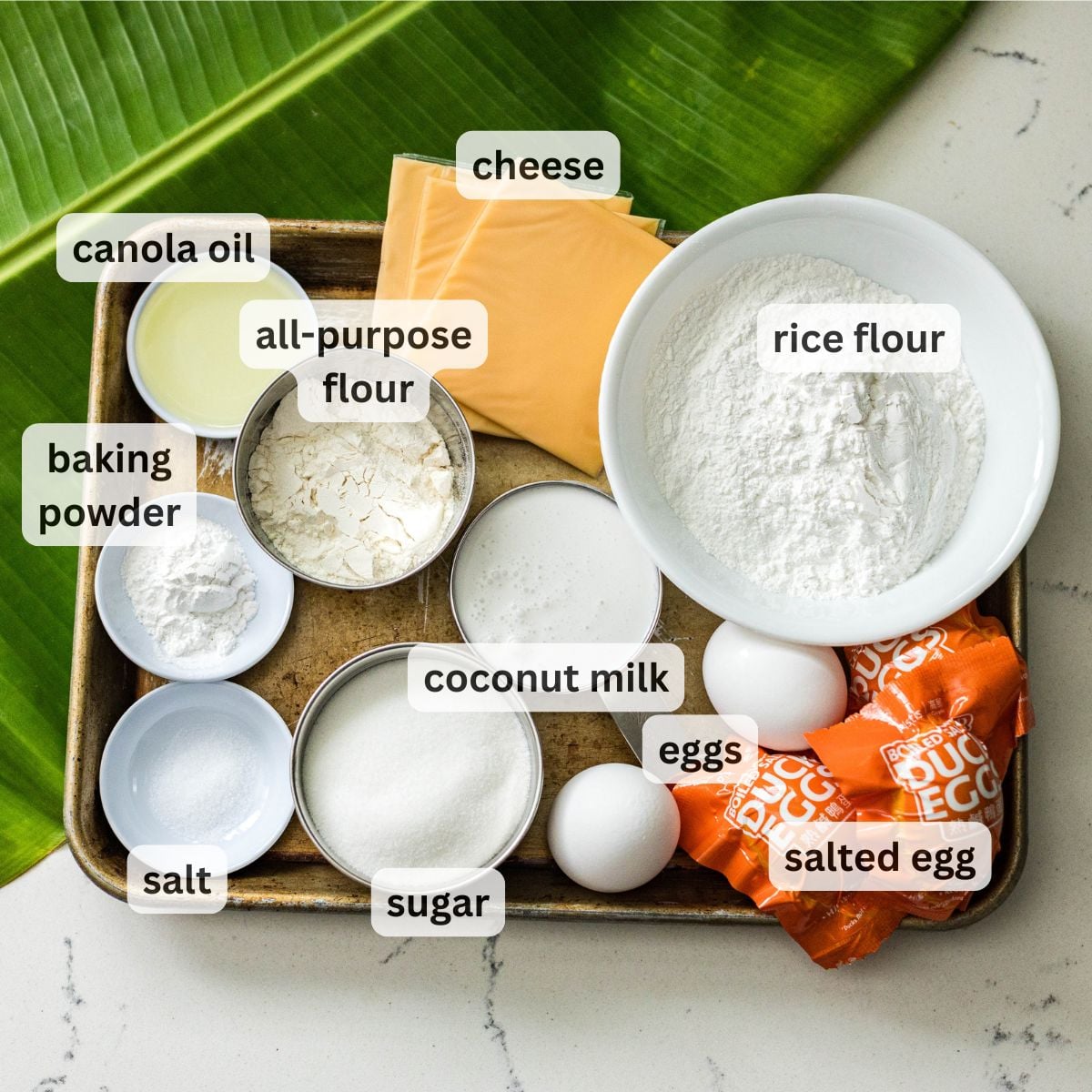 Ingredients for homemade Filipino bibingka with rice flour and coconut milk
