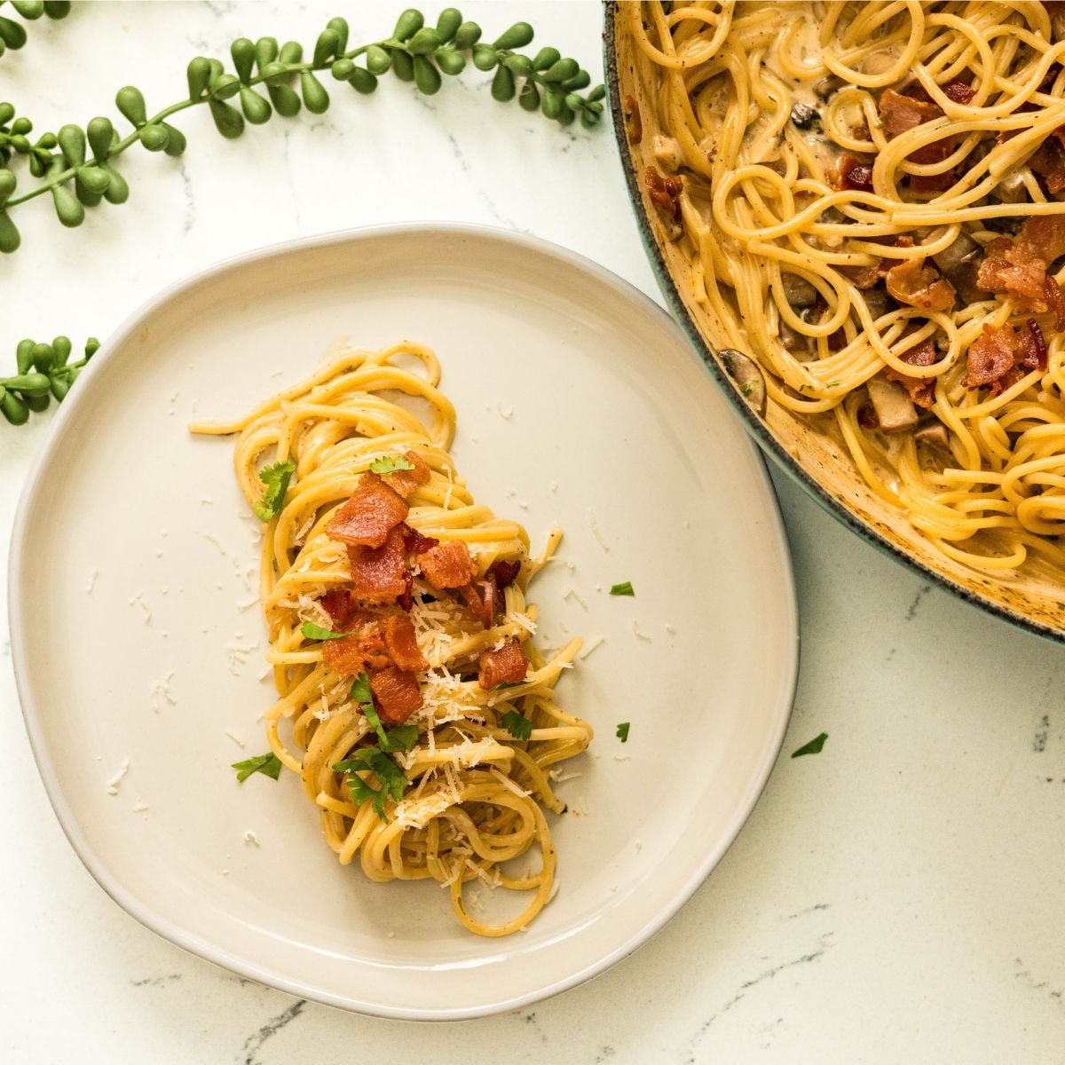 Filipino-style carbonara topped with crispy bacon and parsley