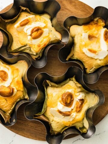 Homemade Filipino bibingka topped with salted egg and cheese