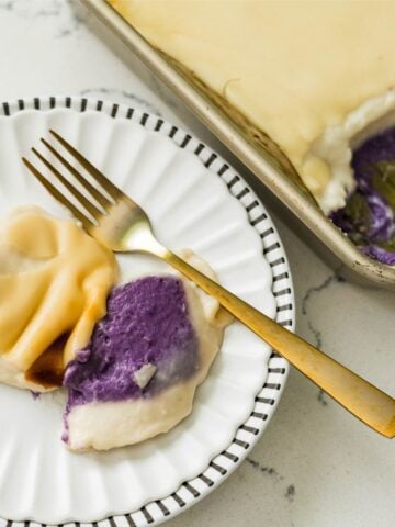 Homemade ube inutak served with creamy coconut topping