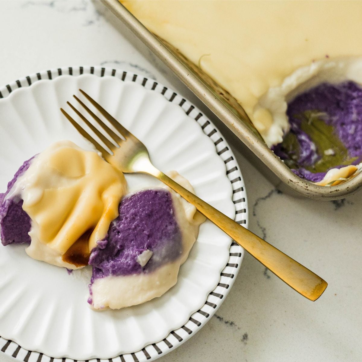 Homemade ube inutak served with creamy coconut topping