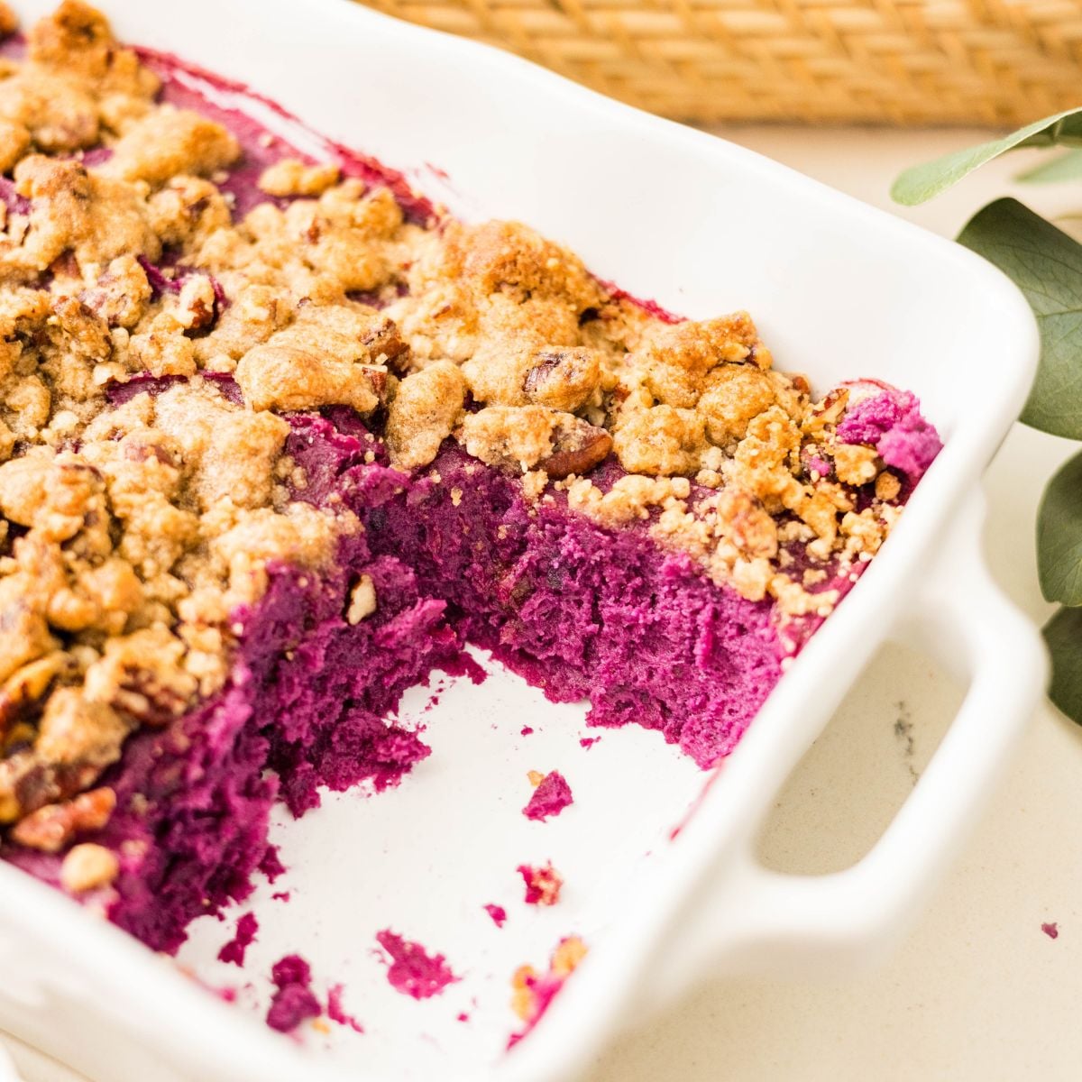 Served purple sweet potato casserole with pecan topping