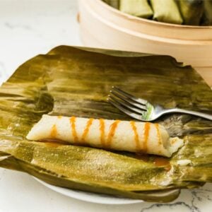 Suman malagkit served with sweet coconut caramel sauce
